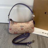 شنطة يد كوتش