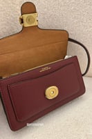 شنطه كوتش تابي ميني عنابي