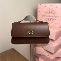 شنطة يد كوتش