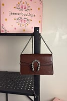 شنطة كتف قوتشي عنابي