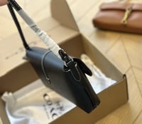 شنطة كتف كوتش