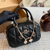 شنطة يد كوتش أسود