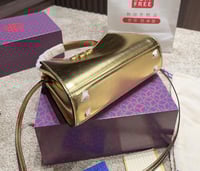 شنطة يد توري بورش ميني ذهبي