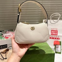 شنطة يد قوتشي