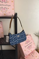 شنطة كتف كوتش