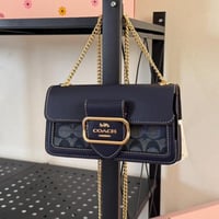 شنطة كتف كوتش