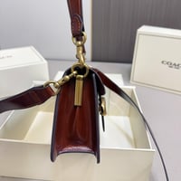 شنطة كوتش تابي لامع