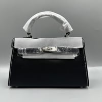 شنطة أسود خيط ابيض