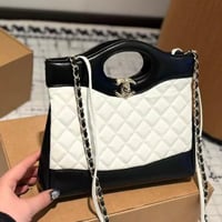 شنطة يد شانيل أبيض