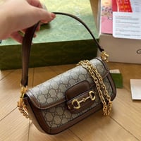 شنطة يد قوتشي