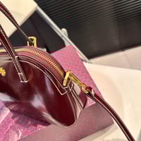 شنطة يد توري بورش مطفي