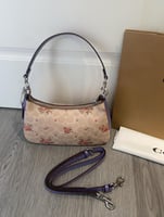 شنطة يد كوتش