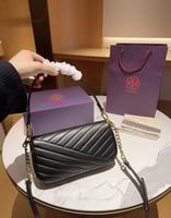 شنطة كتف توري بورش