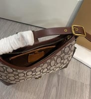 شنطة كتف كوتش