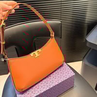 شنطة كتف توري بورش بني