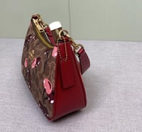 شنطة كتف كوتش