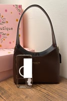 شنطة يد كوتش مديم