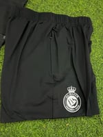 بدلة رياضية سوداء بشعارنادي النصر