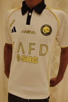 تيشرت نادي النصر بشعار الجديد 2025-2026