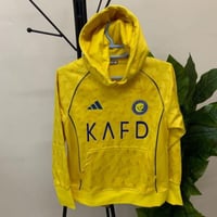 بلوفر شتوي أطفال نادي النصر 2026 مع طباعة اسم ورقم