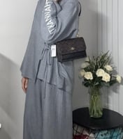 شنطة كوتش كلير اكس سمول بلون بني سجنشر / اسود Mini...