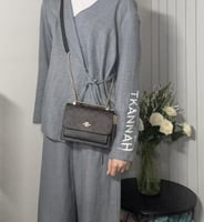 شنطة كوتش كلير اكس سمول بلون بني سجنشر / اسود Mini...