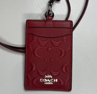 احمر شعار بارز معدن