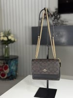 شنطة كوتش كلير اكس سمول بلون بني سجنشر / اسود Mini...