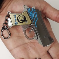 ميدالية مسدس خرز حديد