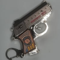 ميداليه مسدس خرز حديد مقاس الاصبع