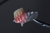 103 . طقم جزئي سفلي 6إلى 9 اسنان Lower Partail Den...