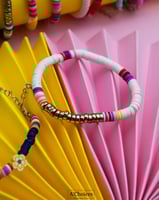 اساور ملونة مع زهرة ونجمة وقلب بعدة ألوان