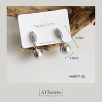 اقراط مطلية بالذهب بحجر الراين بلونين ذهبي وفضي