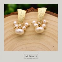 أقراط مصنوعة يدوياً من الفضة والنحاس المطلي بالذهب...