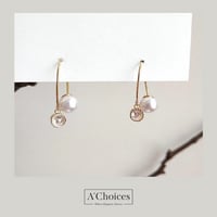 اقراط مطلية بالذهب 18 بتصميم مميز باطراف لولو وزير...