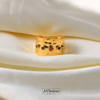 خاتم عريض مطلي بالذهب مع الأحجار الكريمة