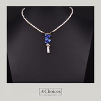 طقم مكون من عقد وأقراط من اللؤلؤ الزراعي والمطلي ب...