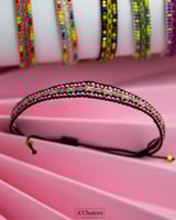 اساور قماشية مصنوعة يدويا بالخرز الملون بعدة أشكال...