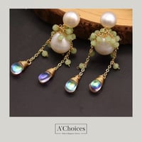 أقراط مصنوعة يدوياً من الفضة والنحاس المطلي بالذهب...