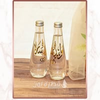 قارورة ماء زجاج