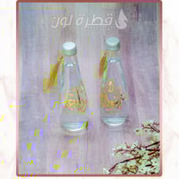 قارورة ماء زجاج