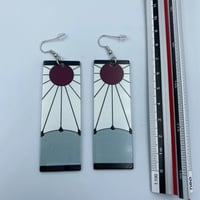 أقراط شخصية تانجيرو