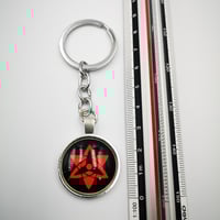 ميدالية لشعار مانجيكيو شارينقان