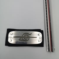 ربطة رأس شعار قرية الورق مكشوط مضيئة