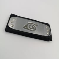 ربطة رأس شعار قرية الورق مضيئة