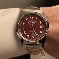 ساعة ويست إند - عربيه اللون عنابي