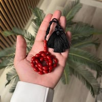 سبحة تراب كهرمان -احمر كركوشة سوداء