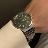 ساعة سيكو كوارتز - حجم ٣٩ لون أخضر مذهب