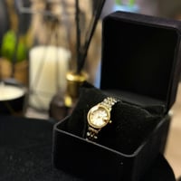 ساعة نسائية بسوار ذهبي وفضي من بروشا BR1007