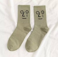 جوارب ملونه بتعابير مختلفة